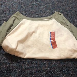 green and cream half sleeve shirt